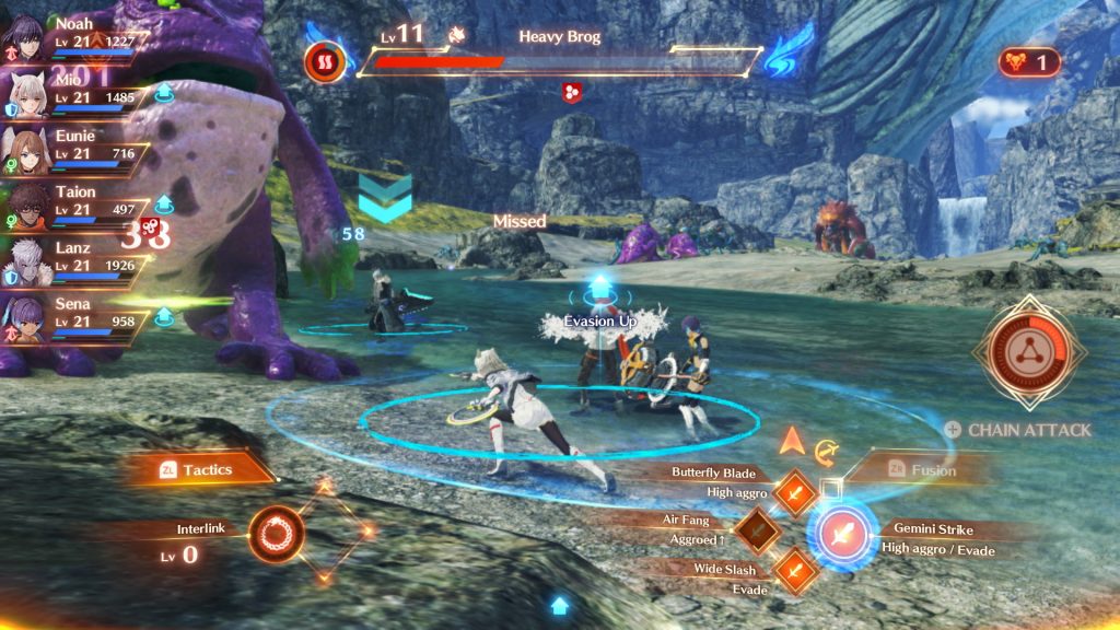 A battle in Xenoblades 3. Big frog on the left.  Cool stuff on screen.