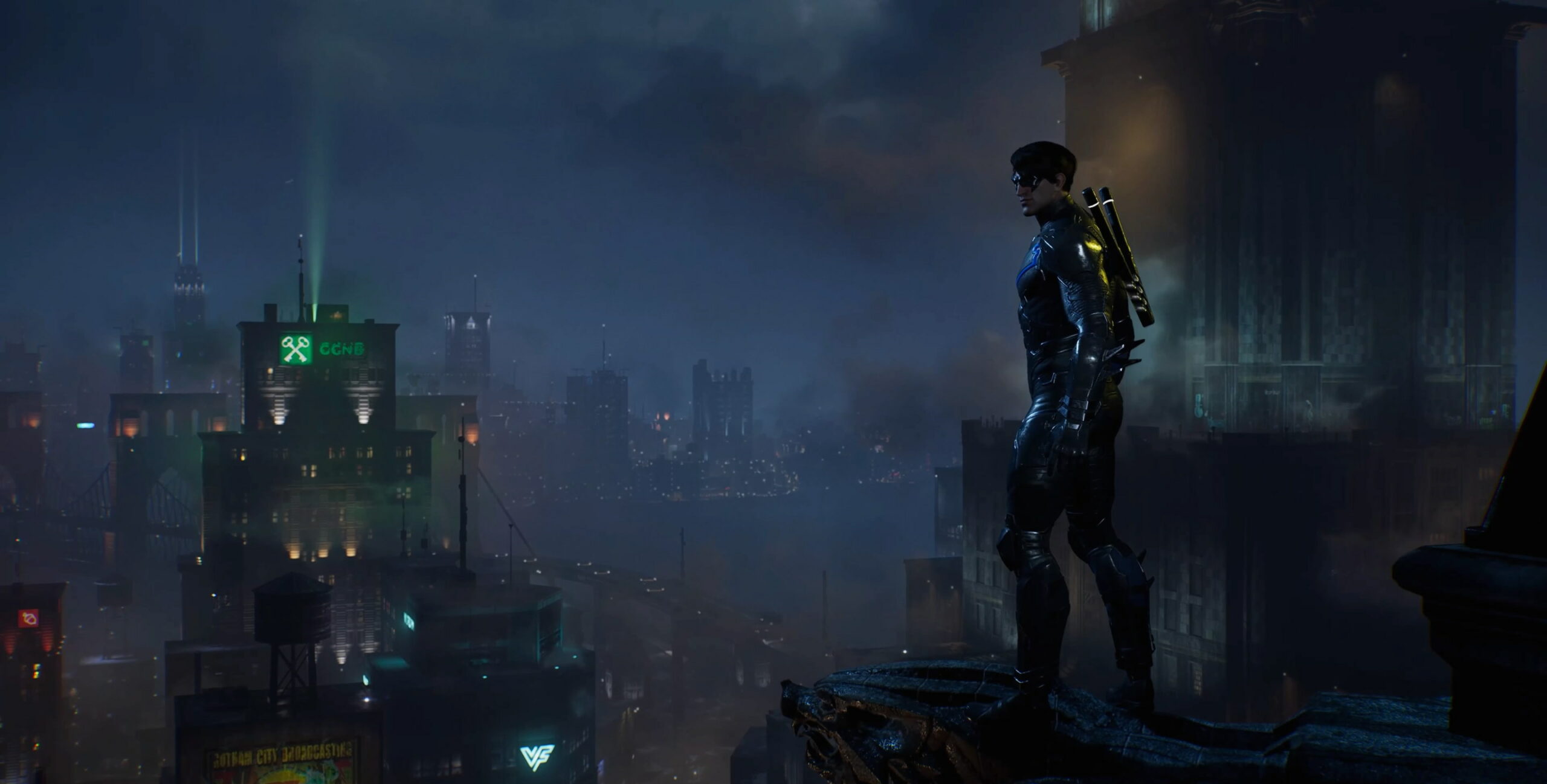 Gotham Knights Nightwing tittar ut över Gotham.